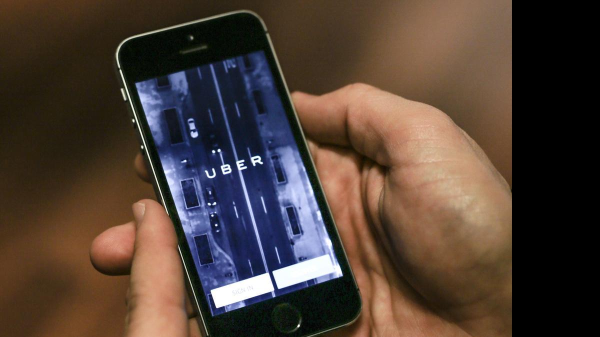 
Uber and similar services use smartphone apps to link people wanting a ride to private drivers who are willing to drive them. The passengers pay a fee to the ride-hailing service, which then pays the drivers.

