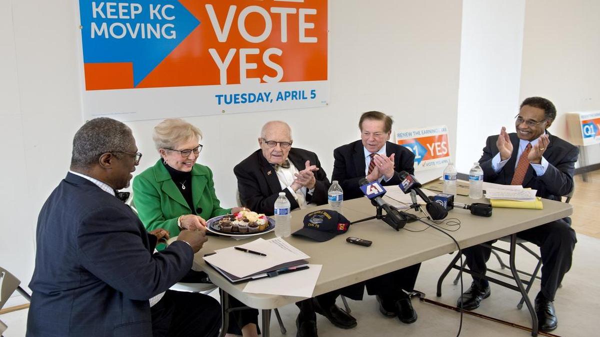 A birthday treat was presented to former Kansas City mayor Kay Barnes as she, current mayor Sly James (left) and former mayors Charles Wheeler, Dick Berkley and Emanuel Cleaver gathered Wednesday.