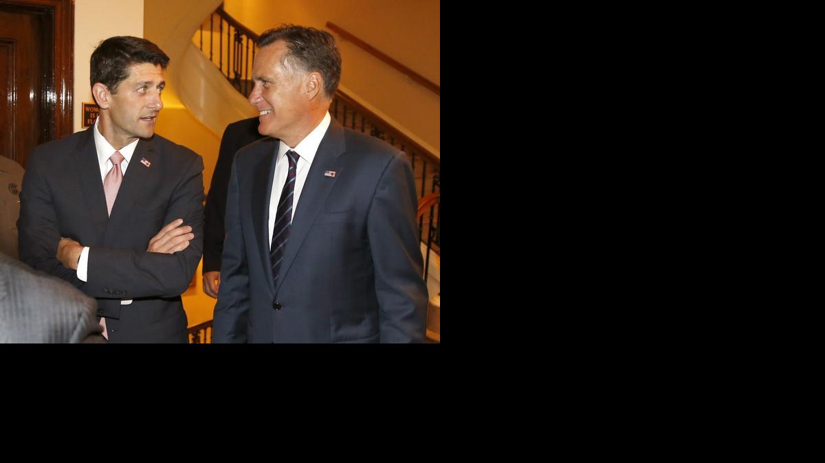 
Former Massachusetts Gov. Mitt Romney, right and his former vice presidential running mate U.S. Rep. Paul Ryan, R-Wis.
