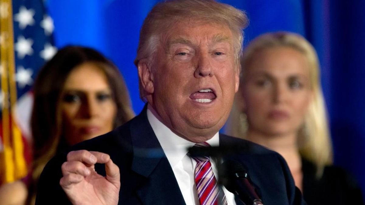 Republican presidential candidate Donald Trump is seen through his teleprompter as he speaks at the Trump National Golf Club WestchesterTuesday in Briarcliff Manor, N.Y.