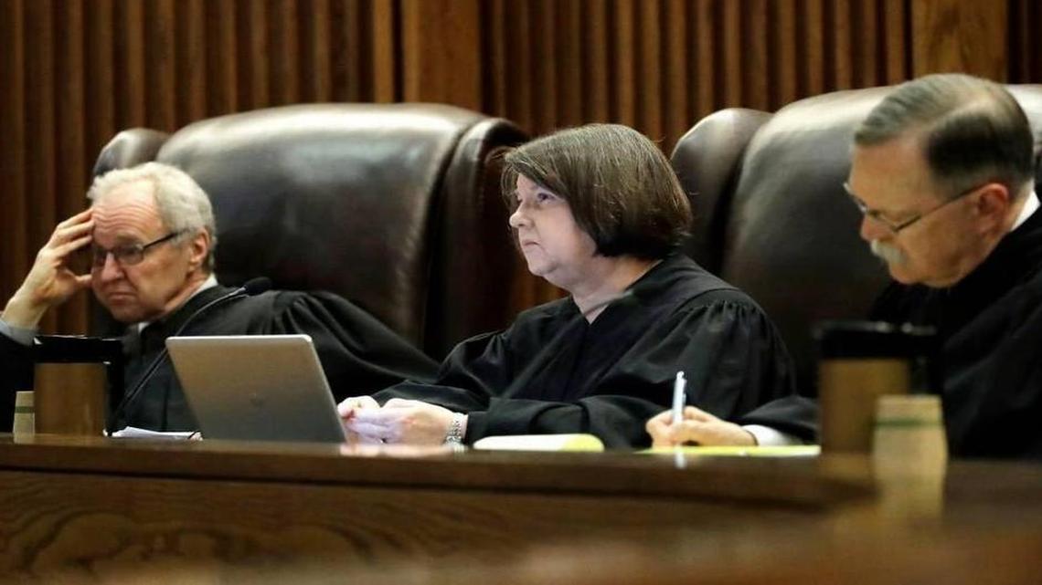 Justices Eric Rosen (from left), Marla Luckert and Lawton Nuss listened to arguments in the school funding case in the Kansas Supreme Court on Sept. 21, 2016, in Topeka.