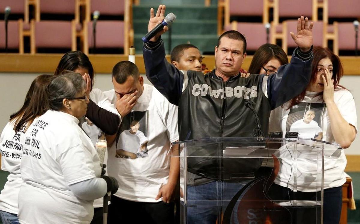 Santiago Quintero was surrounded by family members when he raised his hands declaring, “hands up, don’t shoot,” during a vigil for his 23-year-old son John Paul Quintero, who was killed by Wichita police in 2015.
