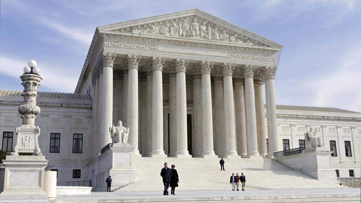 U.S. Supreme Court Building on a sunny day.