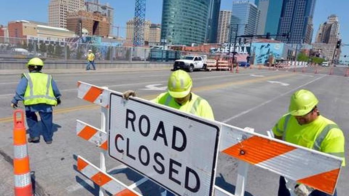 The Grand Boulevard Bridge in downtown Kansas City reopens to traffic in mid-morning Friday. It was shut down for emergency structural problems on May 6.