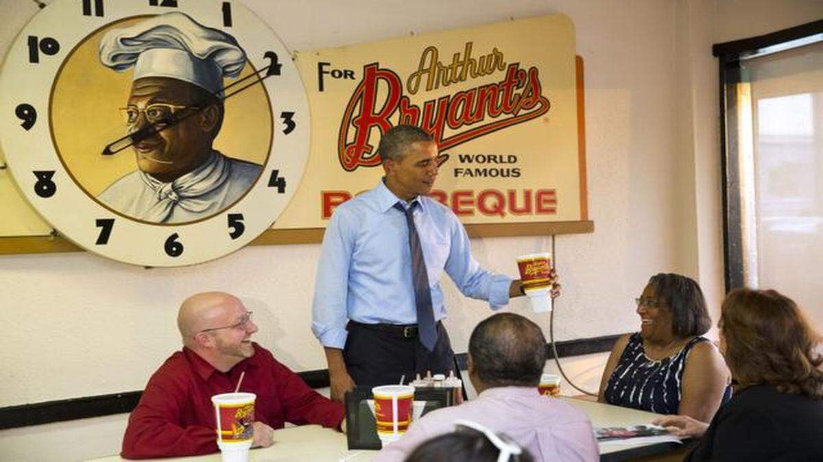
President Barack Obama met with four Kansas City residents who had written him letters in July at Arthur Bryant’s in Kansas City. Victor Fugate is on the left.
