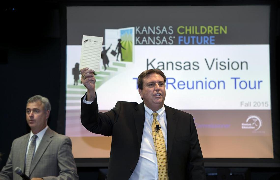 Kansas Education Commissioner Randy Watson, center, and Deputy Commissioner Brad Neuenwander, left, during a 2015 forum in Olathe.