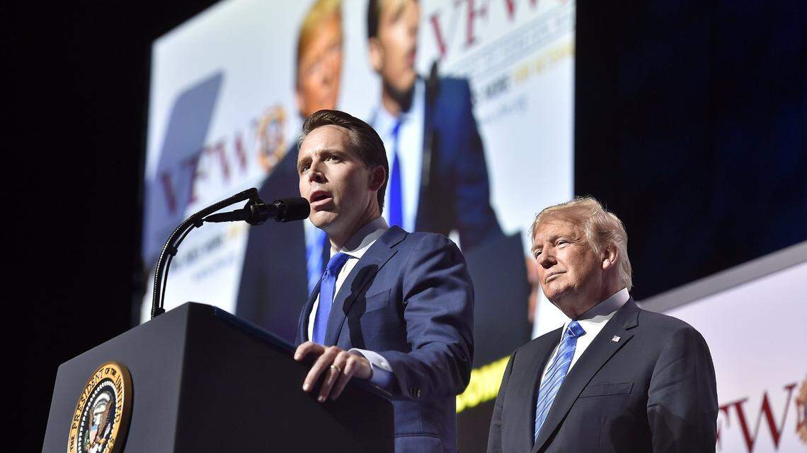 Missouri Republican Josh Hawley joins President Donald Trump on stage during a 2018 speech in Kansas City. Hawley was a candidate for U.S. Senate at the time.