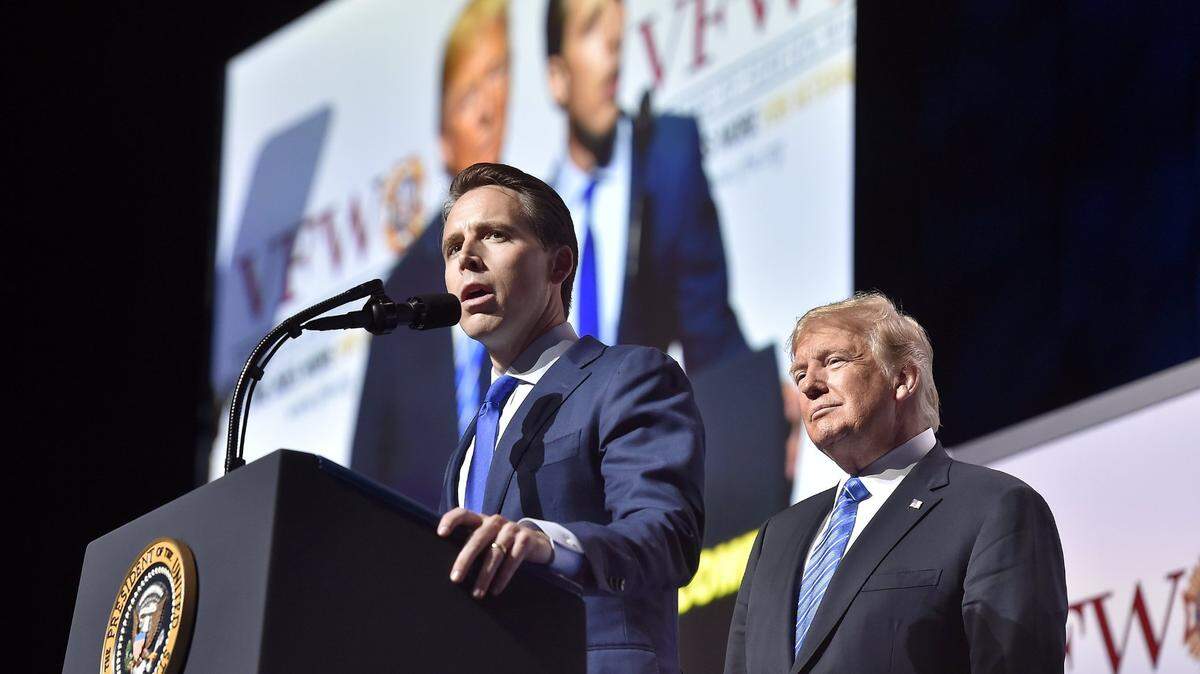 Republican Josh Hawley speaks during a 2018 event with then-President Donald Trump in Kansas. Hawley was elected to the U.S. Senate later that year.