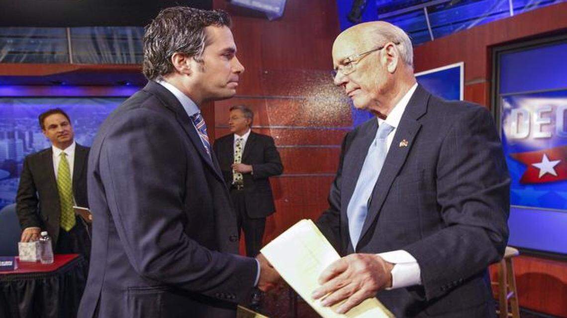 
Independent candidate Greg Orman, left, shakes hands with Sen. Pat Roberts, R-Kan., following their debate on Oct. 15 in Wichita. If the Republicans win back the Senate in November, the winner of the Roberts-Orman race could reap big benefits. 


