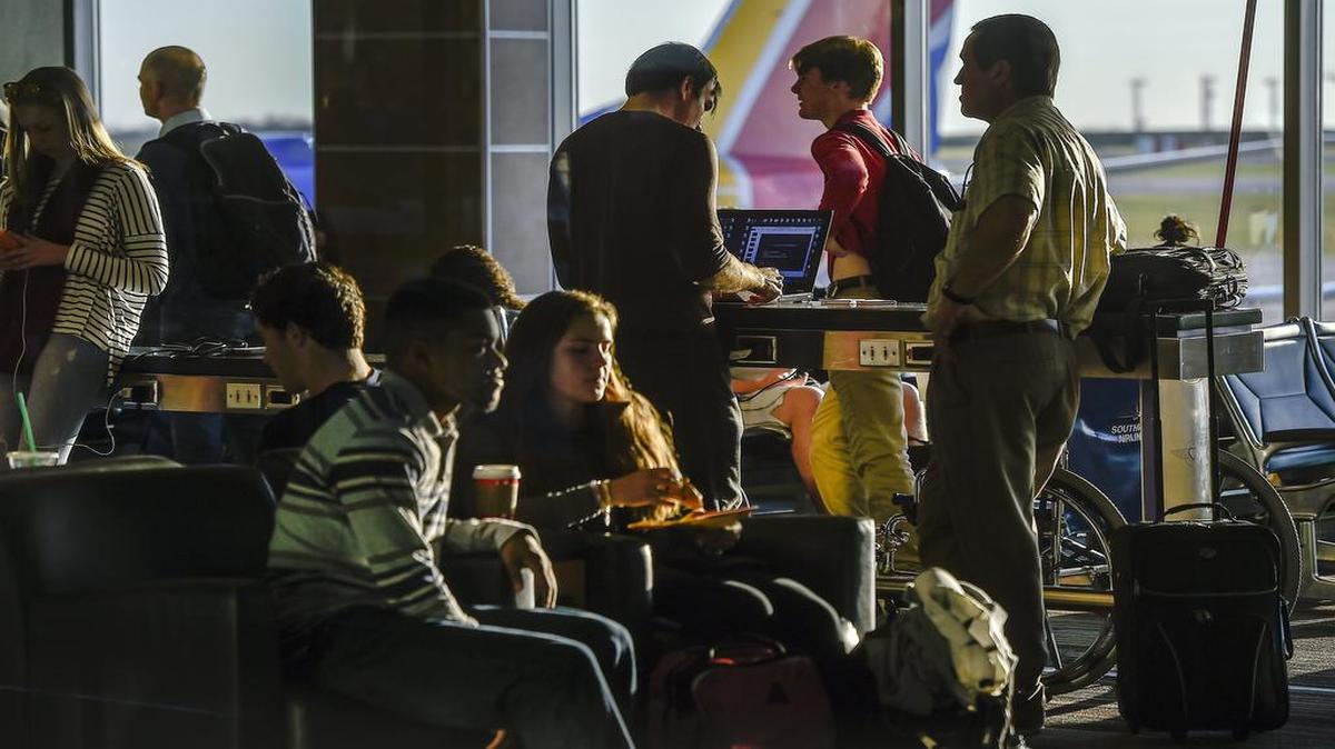 Passengers waited in the gate area in Terminal B of Kansas City International Airport on Nov. 24.