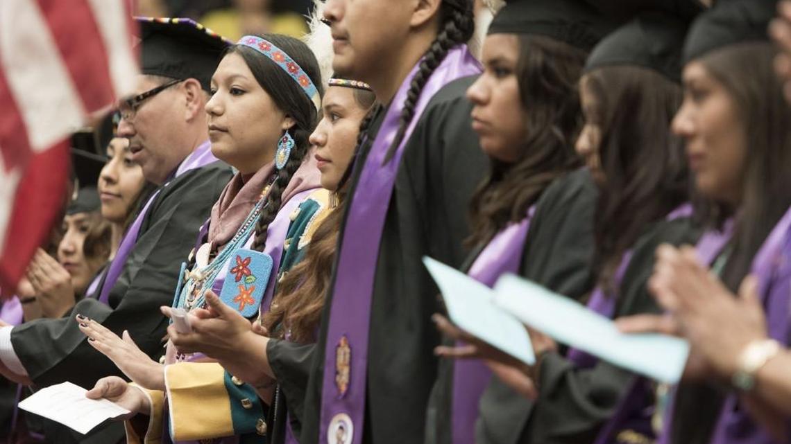 
Some students chose to wear traditional regalia during the Haskell Indian Nations University commencement at the Lawrence campus last May. But the federally funded university’s low graduation rate reflects a wide variety of problems. 


