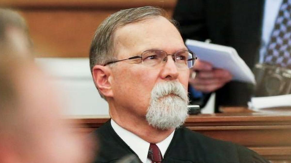 Kansas Supreme Court Chief Justice Lawton Nuss looked on as Kansas Gov. Sam Brownback discussed school finance during his final State of the State address on Jan. 2 on the floor of the Kansas House.