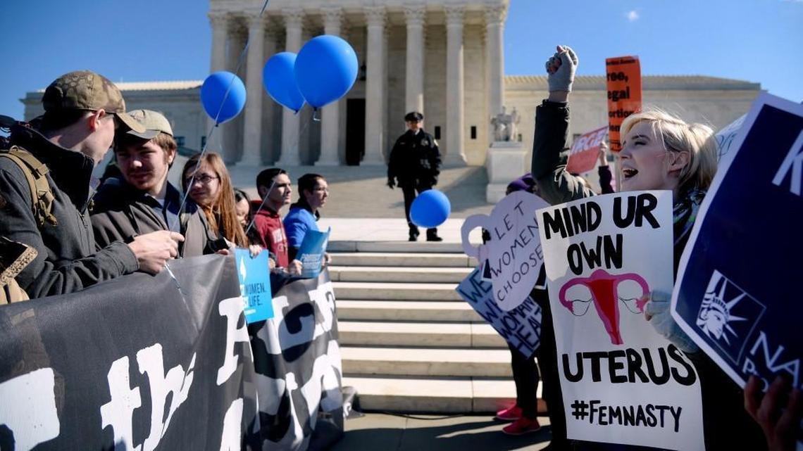 Supporters of legal access to abortion, as well as anti-abortion activists, rallied outside the U.S. Supreme Court in 2016. On Tuesday, a new law took effect in Missouri that some say will further limit women’s access to abortions.