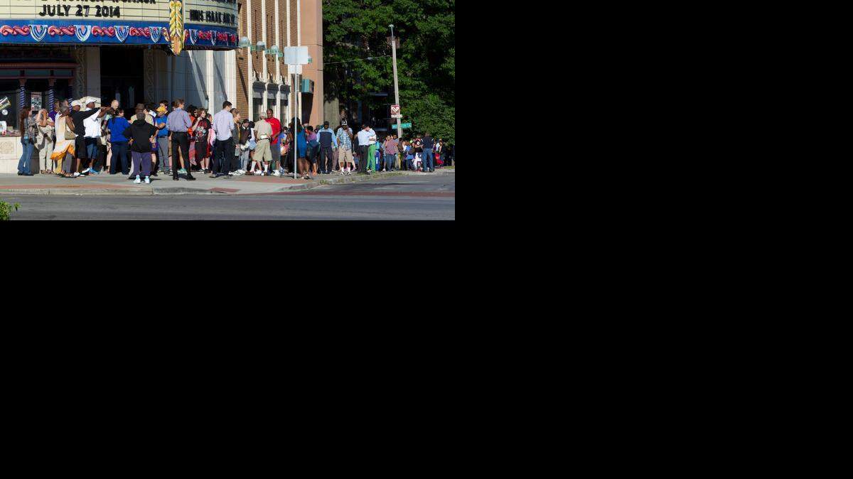 
A line stretched about two and a half blocks outside the Uptown Theater Monday morning with people waiting to get tickets to see President Obama speak there on Wednesday. Many of the people in line had camped out for nearly 24 hours.
