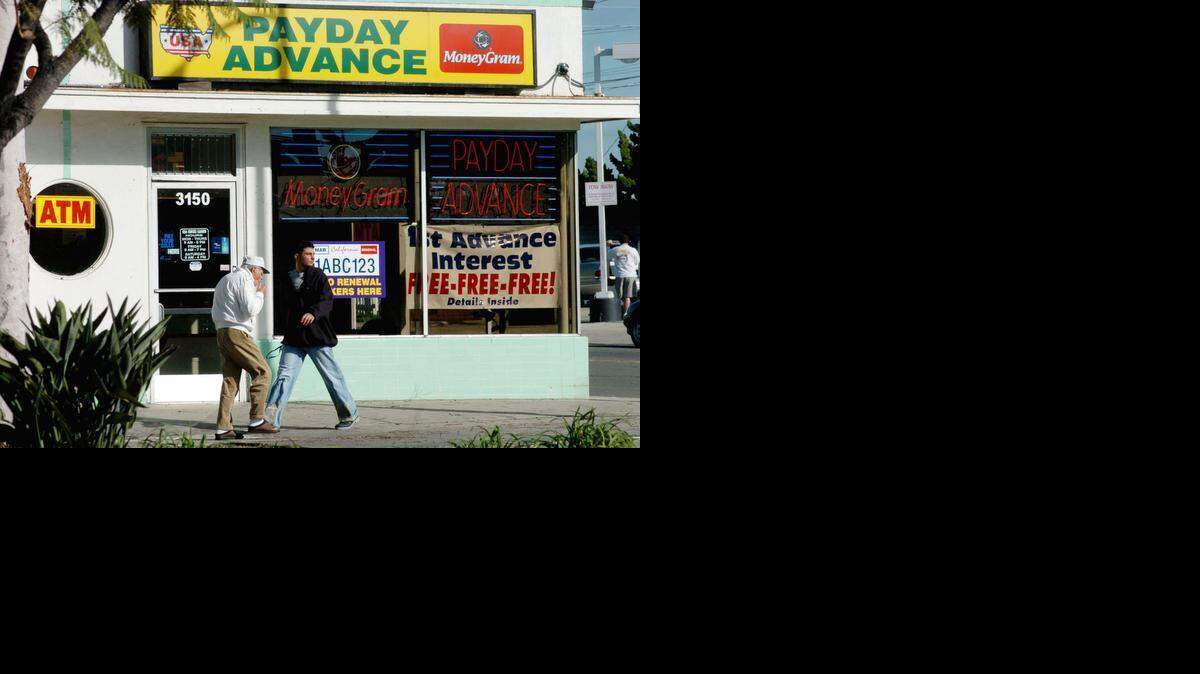 
Payday loan shops like this one in San Diego could have to change practices under rules to be offered today by federal regulators.
