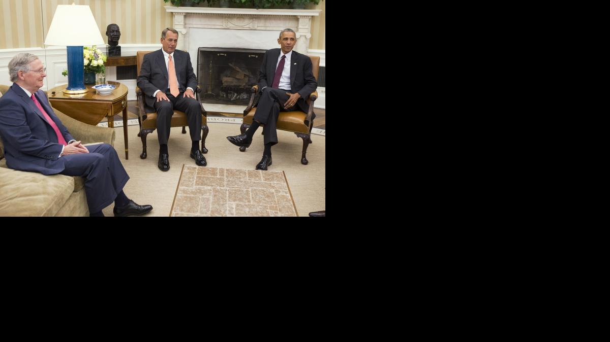 
President Barack Obama meets with Senate Minority Leader Mitch McConnell of Ky., left, and House Speaker John Boehner of Ohio in the Oval Office in September
