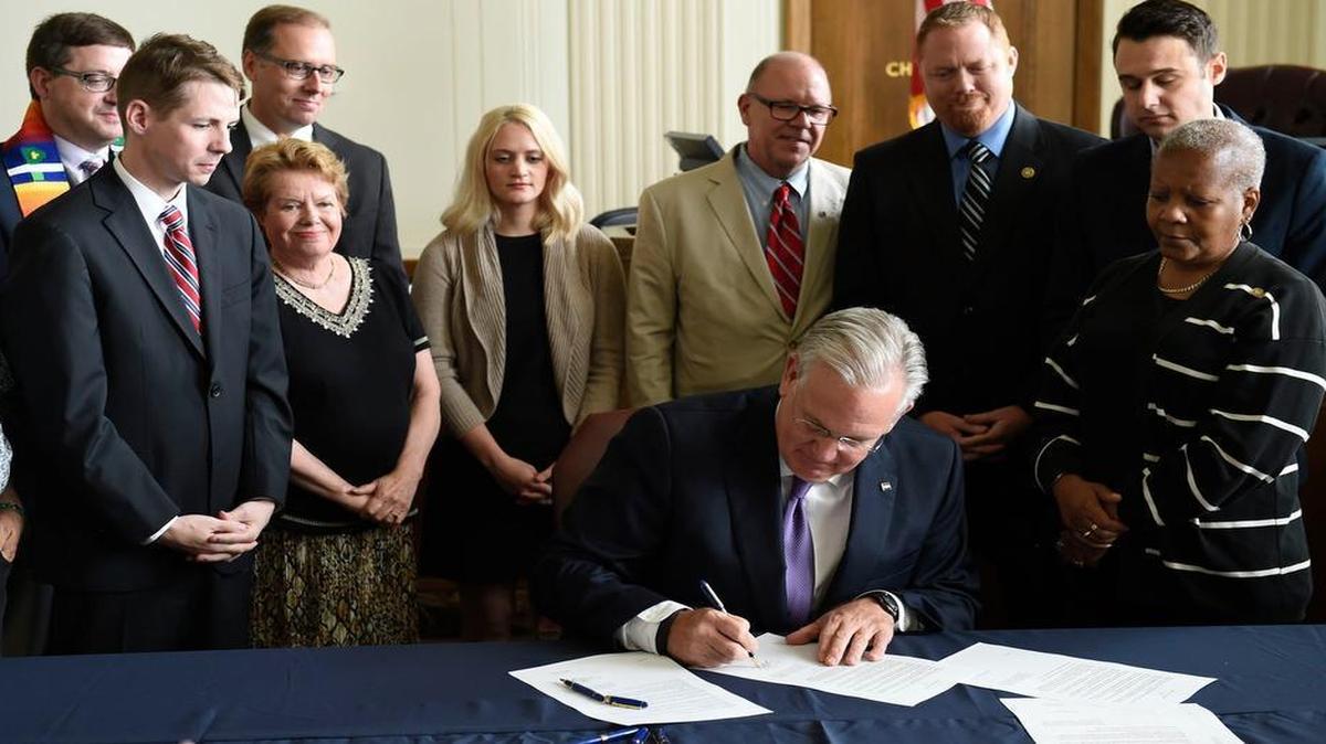 
Missouri Gov. Jay Nixon was in Kansas City Tuesday to sign an execuive order directing all departments, agencies, boards and commissions in the executive branch to take all necessary measures to ensure compliance with the U.S. Supreme Court’s decision establishing a Constitutional right to same-sex amrriage. The signing took place at the Jackson County Courthouse.

