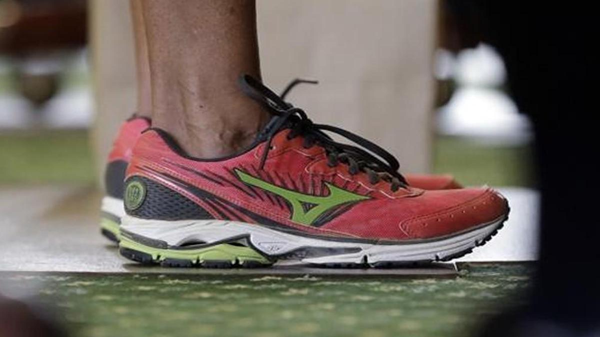 Sen. Wendy Davis, D-Fort Worth, wore tennis shoes in place of her dress shoes to prepare for a 13-hour filibuster in an effort to kill a stringent abortion bill.