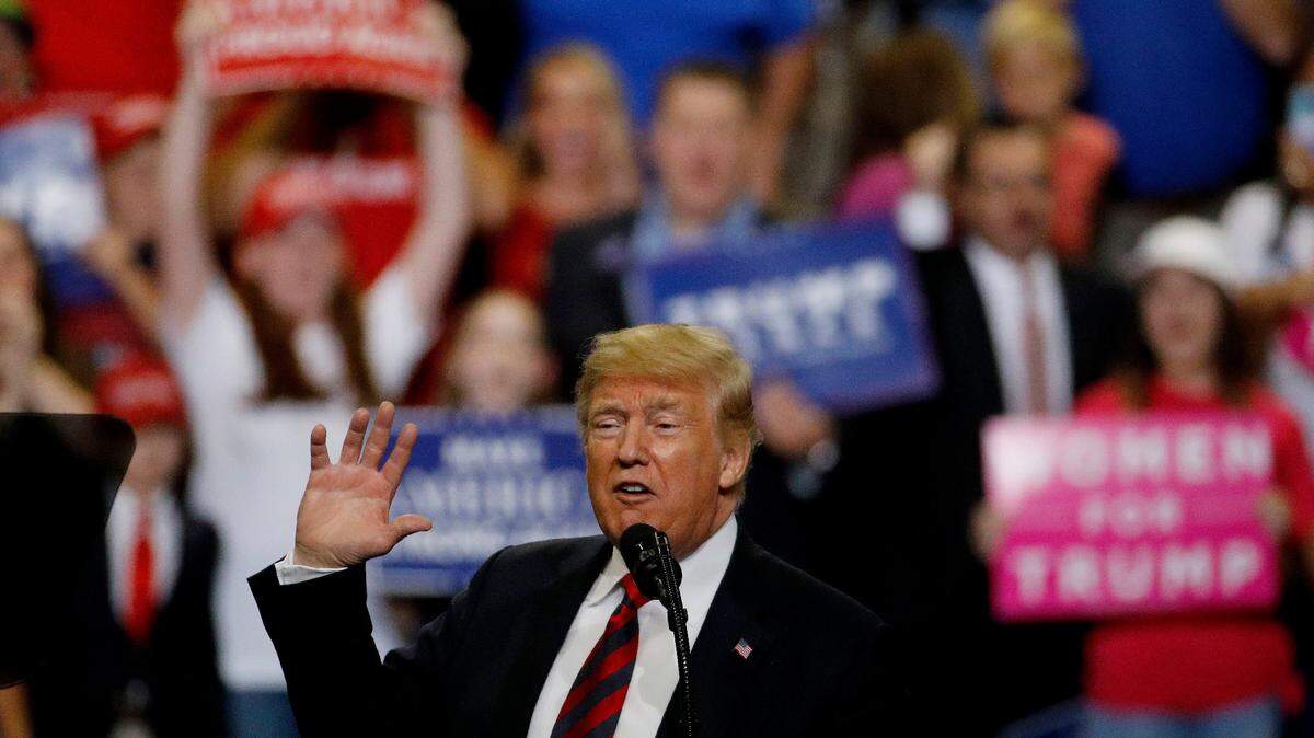 President Donald Trump addresses the crowd during a campaign rally Friday, Sept. 21, 2018, in Springfield, Mo. (AP Photo/Charlie Riedel)