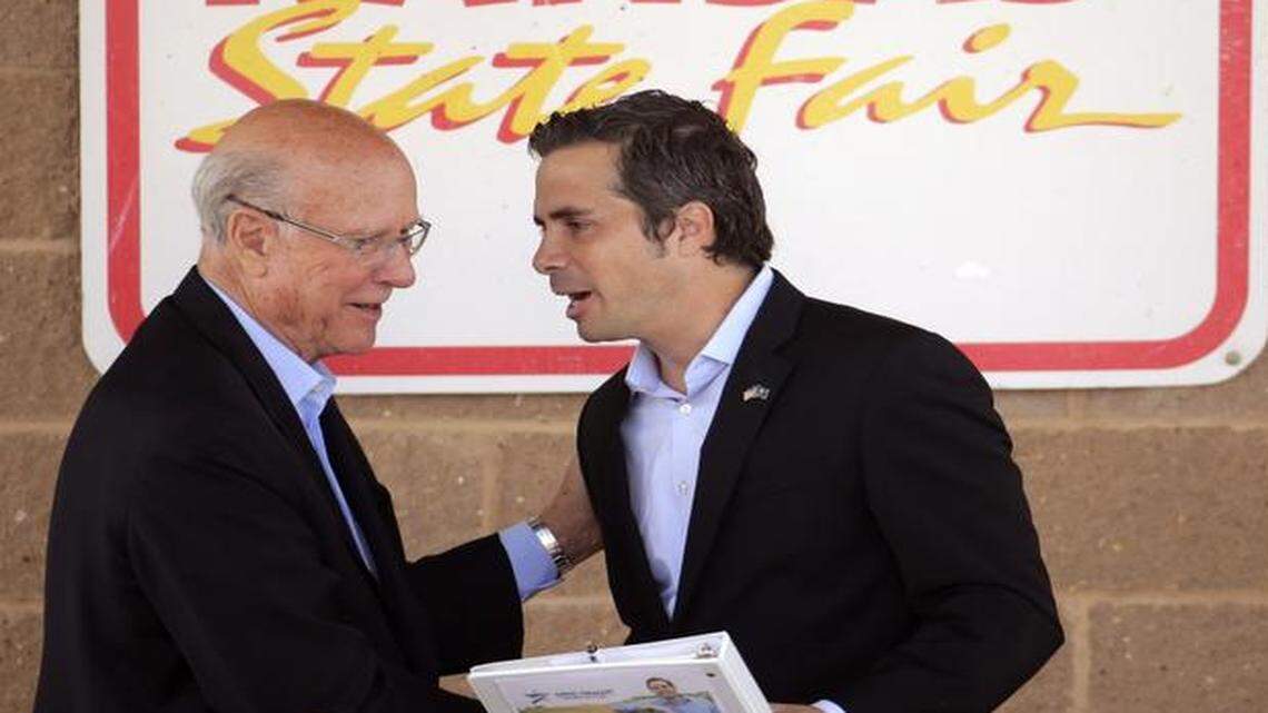
Republican Sen. Pat Roberts (left) and independent candidate Greg Orman spoke in early September after a debate at the Kansas State Fair in Hutchinson, Kan.
