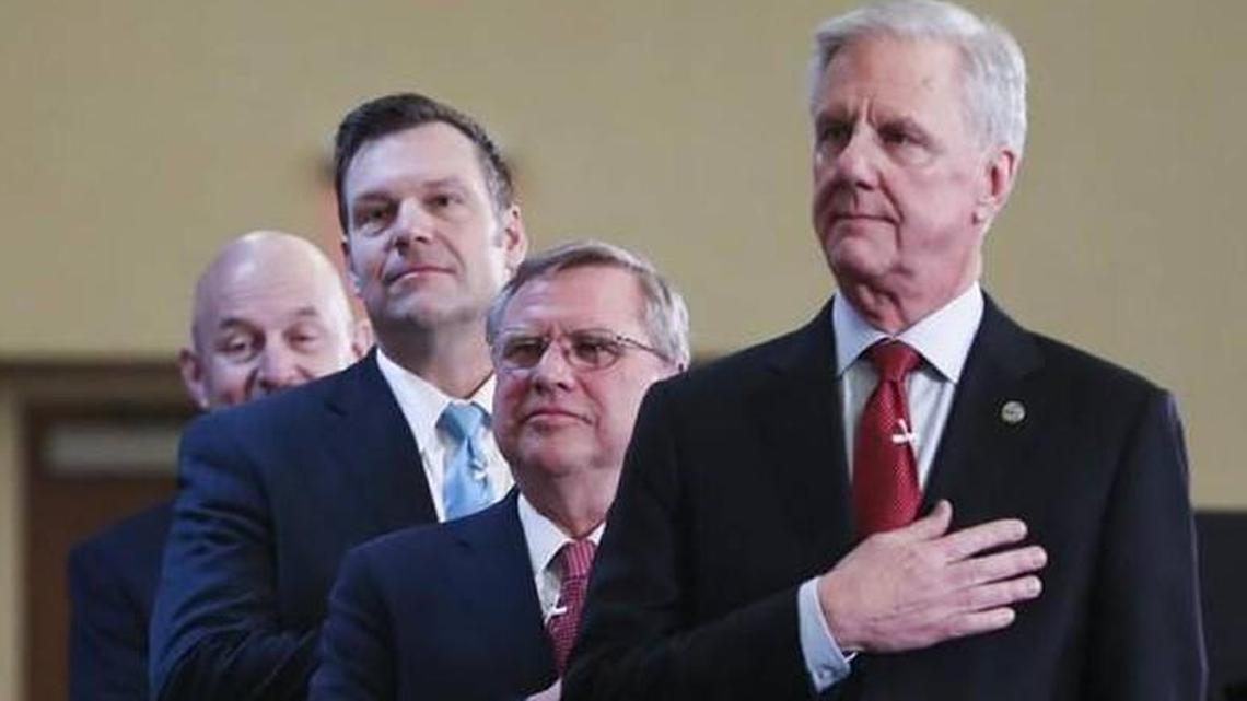 Wichita businessman Wink Hartman (right) is dropping out of the race for Kansas governor and endorsing Kris Kobach (second from left). Ken Selzer (left) and Mark Hutton (third from left) are also seeking the GOP nomination.