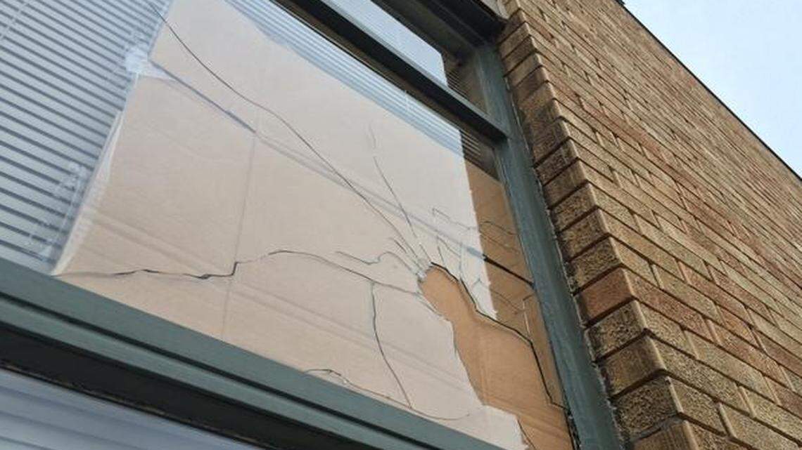
Responding officers found a broken window on the northwest side of the building. On the ground below the window were two broken bottles with paper towels sticking out of the necks of the bottle.
