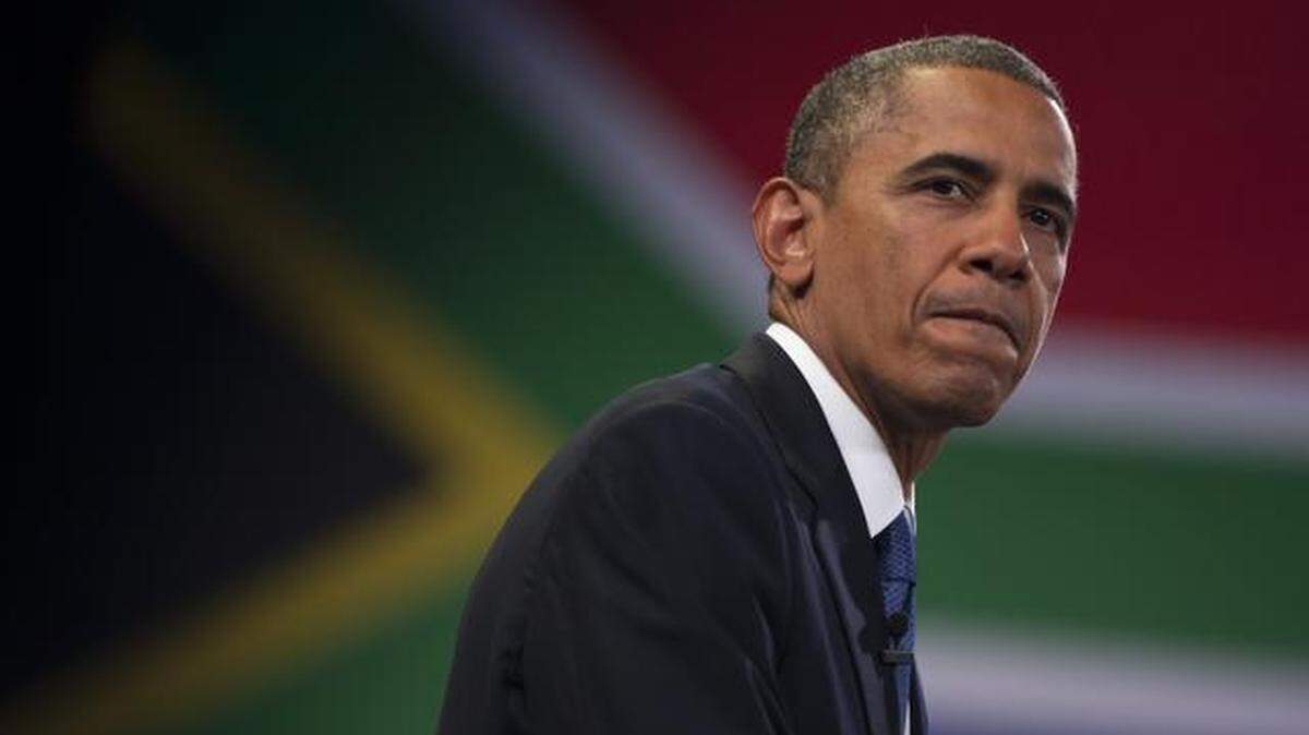 U.S. President Barack Obama pauses during a town hall meeting with young African leaders at the University of Johannesburg Soweto on Saturday, June 29, 2013, in Johannesburg, South Africa.