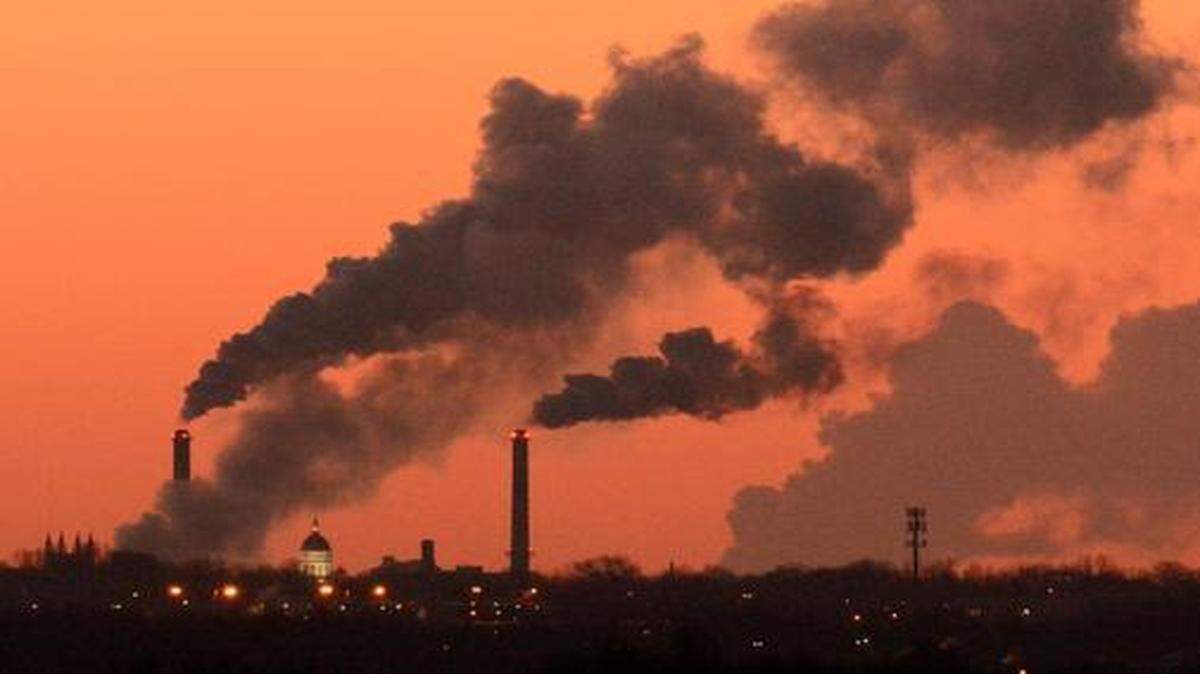 
The dome of Jesse Hal (left) is framed between the twin stacks of the power plant at the University of Missouri before sunrise Feb. 27 in Columbia, Mo.
