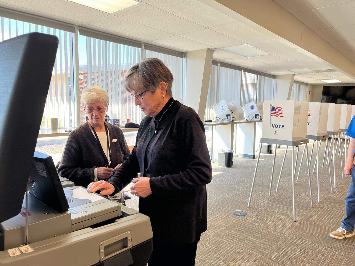 Kansas Gov. Laura Kelly votes on Monday in the presidential preference primary.