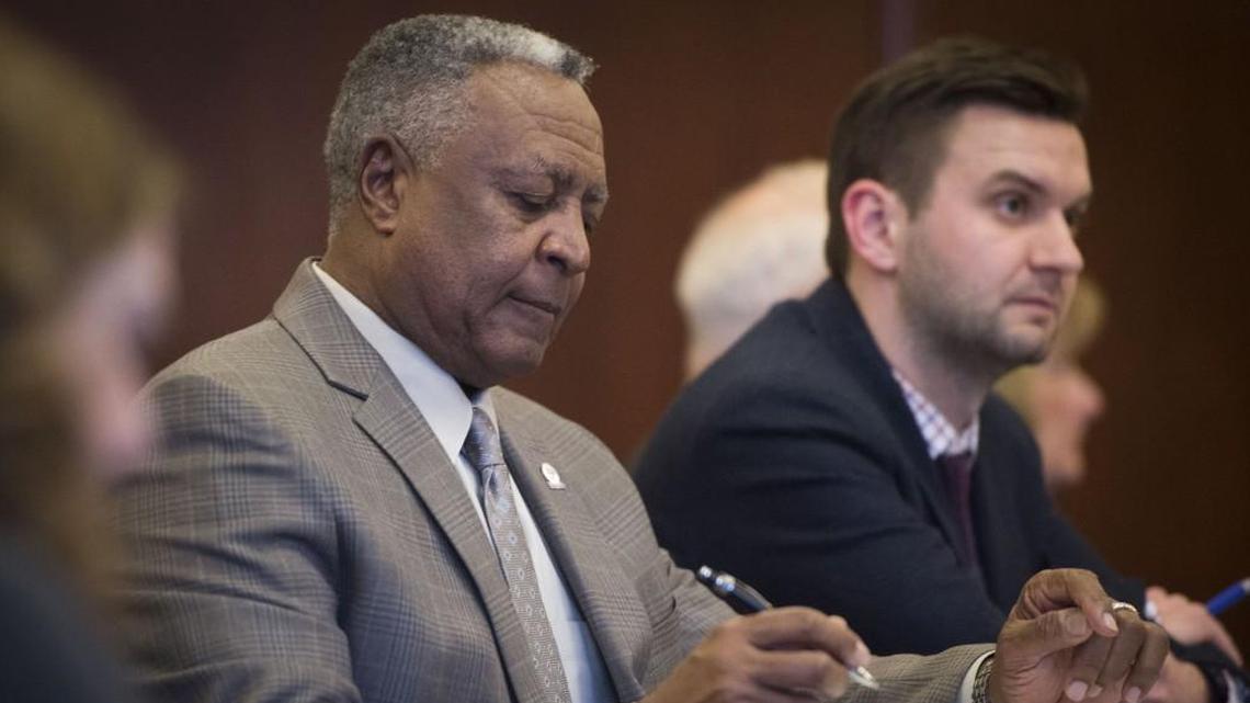 Jackson County Executive Frank White attended a County Legislature meeting earlier this year with chief of staff Caleb Clifford at his side.