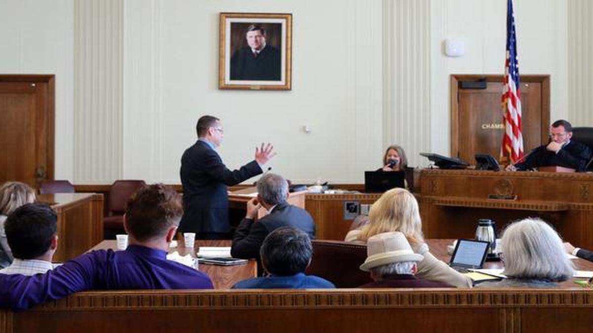 American Civil Liberties Union attorney Anthony E. Rothert (center) noted Thursday in Kansas City that some kinds of marriages not permitted in Missouri are recognized in the state as he argued for same-sex marriage recognition in Missouri.