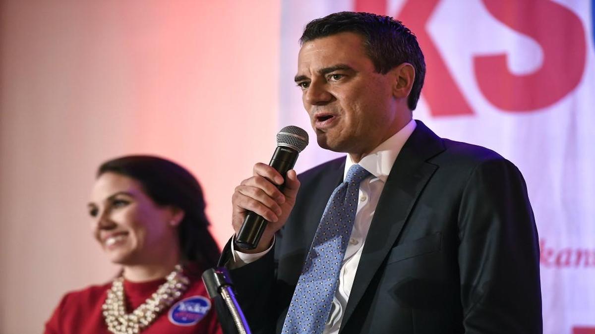 Kevin Yoder with his wife, Brooke, spoke to supporters on election night at the Overland Park Marriott.