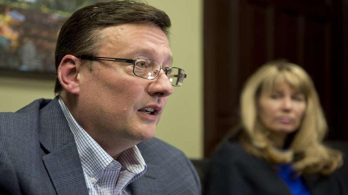 After Mike Sanders (left) left the job of county executive, his wife, Georgia (right), was hired as an aide to legislator Garry Baker, who was appointed to fill the position of Frank White, who took over as county executive.