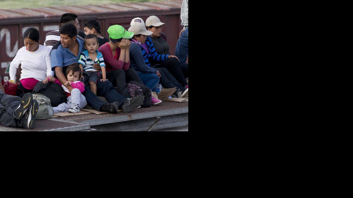 
In this July 12 photo, Central American migrants rode a freight train during their journey toward the U.S.-Mexico border in Ixtepec, Mexico. The number of family units and unaccompanied children arrested by Border Patrol in the Rio Grande Valley has doubled in the first nine months of this fiscal year compared to the same period last year. 

