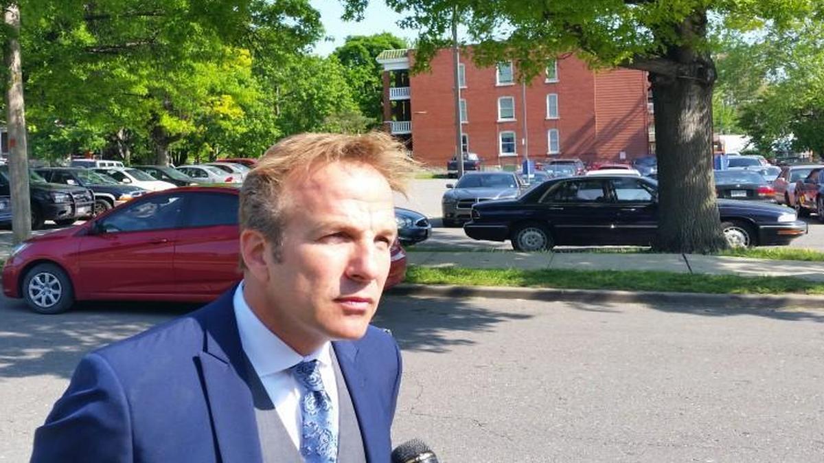 Jarrett Johnson, a defense attorney for teen murder suspect Trevon Henry, spoke with reporters Friday morning after a judge certified Henry, 15, to stand trial on a murder charge as an adult.