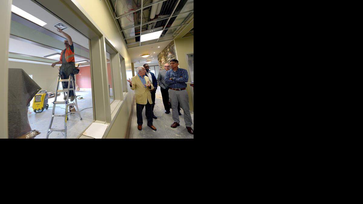 
 Work continues on the first of three planned buildings of the St. Michael’s Veterans Center. Cliff Cohn (front left), Dennis Watts and Robert Schock, all of Yarco Co., and Eric Verzola of Catholic Charities, toured the building recently.



