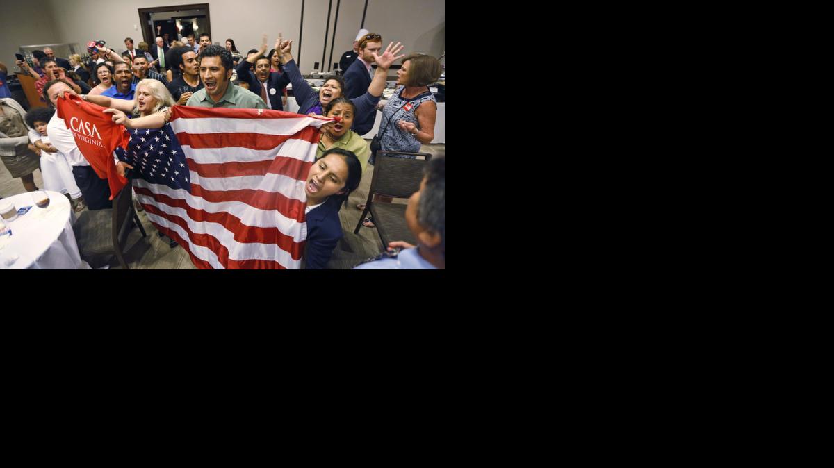 
Immigration reform supporters crash the primary-night party of House Majority Leader Eric Cantor, R-Va., after he delivered a concession speech in Richmond, Va., Tuesday.
