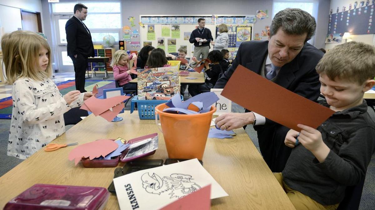 Kansas Gov. Sam Brownback visited Roesland Elementary School in Roeland Park last year. In the lawsuit Petrella v. Brownback, parents in the Shawnee Mission School District argue that Kansas shouldn’t cap the amount of local property tax money that the district can spend on education. 