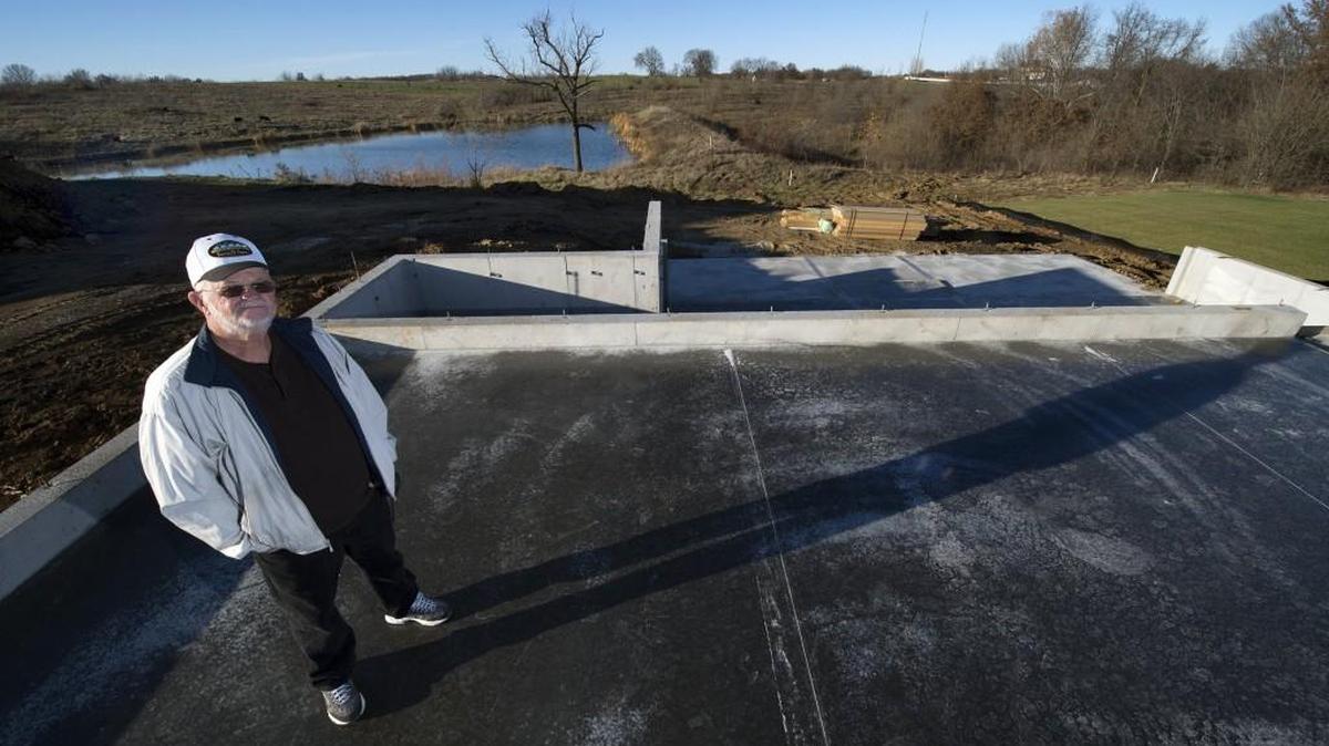 Builder and developer Earl Freeman is constructing houses in The Acres at Freeman Farms South, just north of North 130th Street and Hollingsworth Road in western Kansas City, Kan. A newly poured foundation for a house in the subdivision is nearly four miles from the nearest fire station.