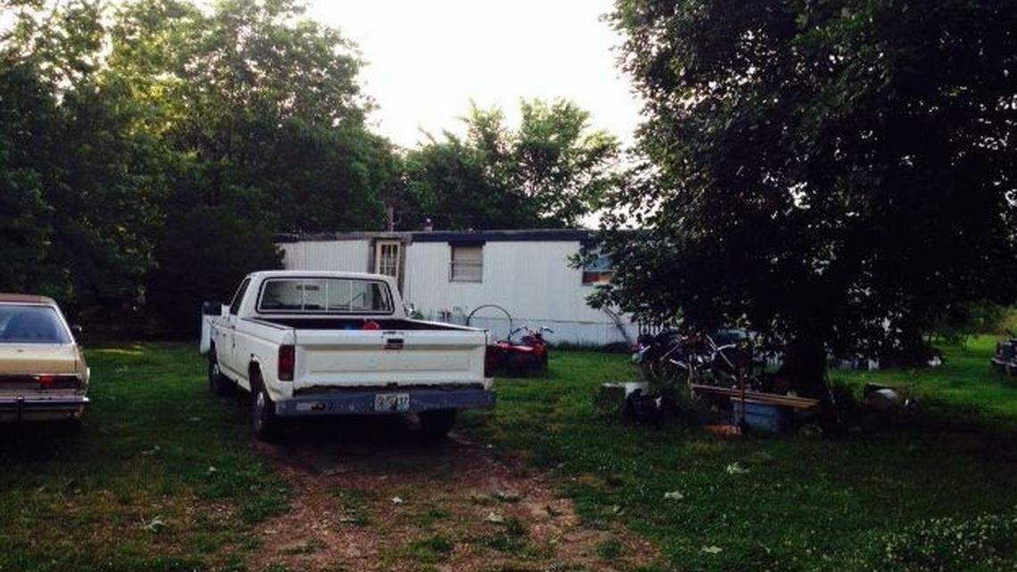 
John Mark Reidle lives in this trailer on a county road just west of Aurora, Mo.
