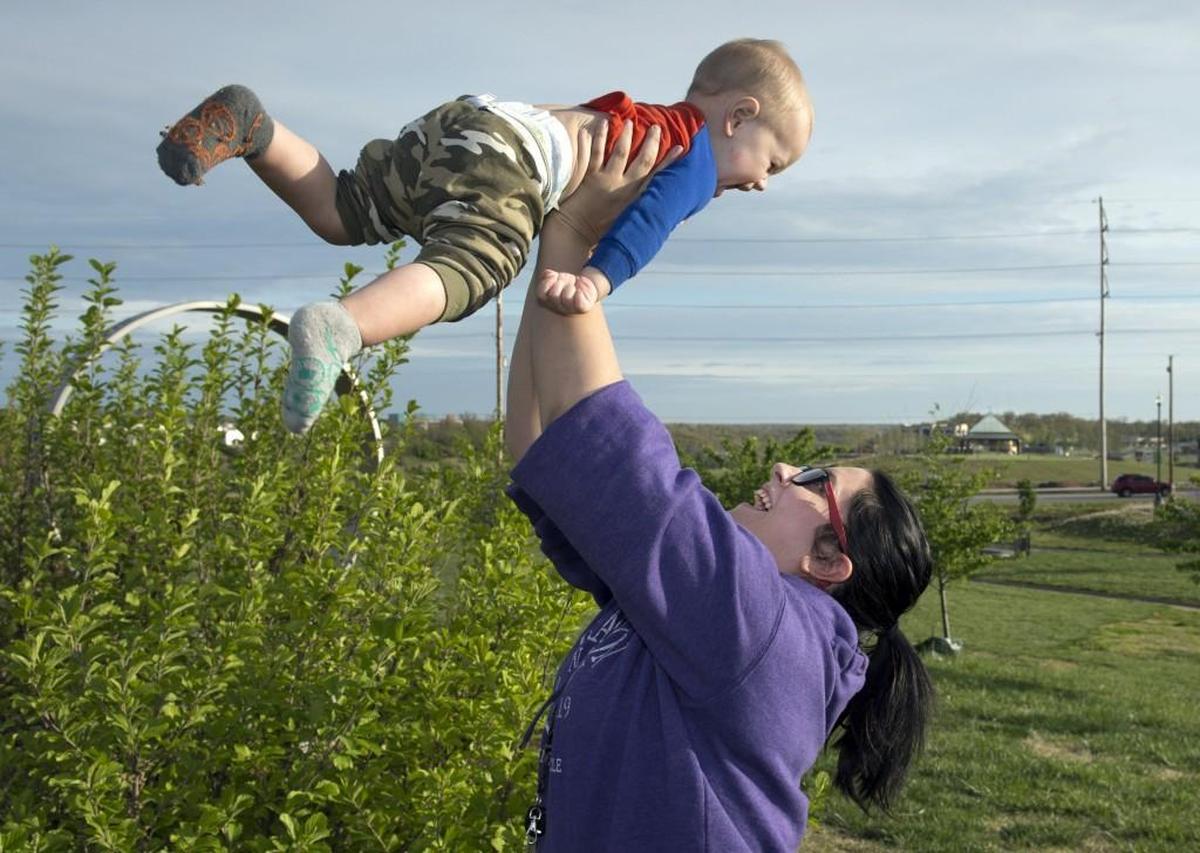 A mother plays with her son at Joplin’s Cunningham Park in this file photo. 