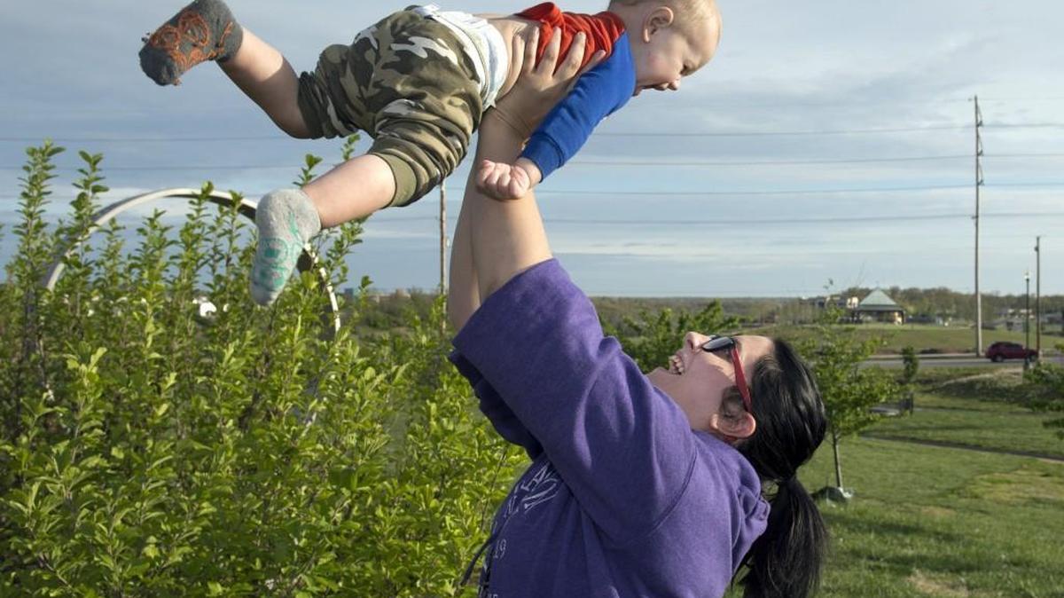 A mother plays with her son at Joplin’s Cunningham Park in this file photo. 