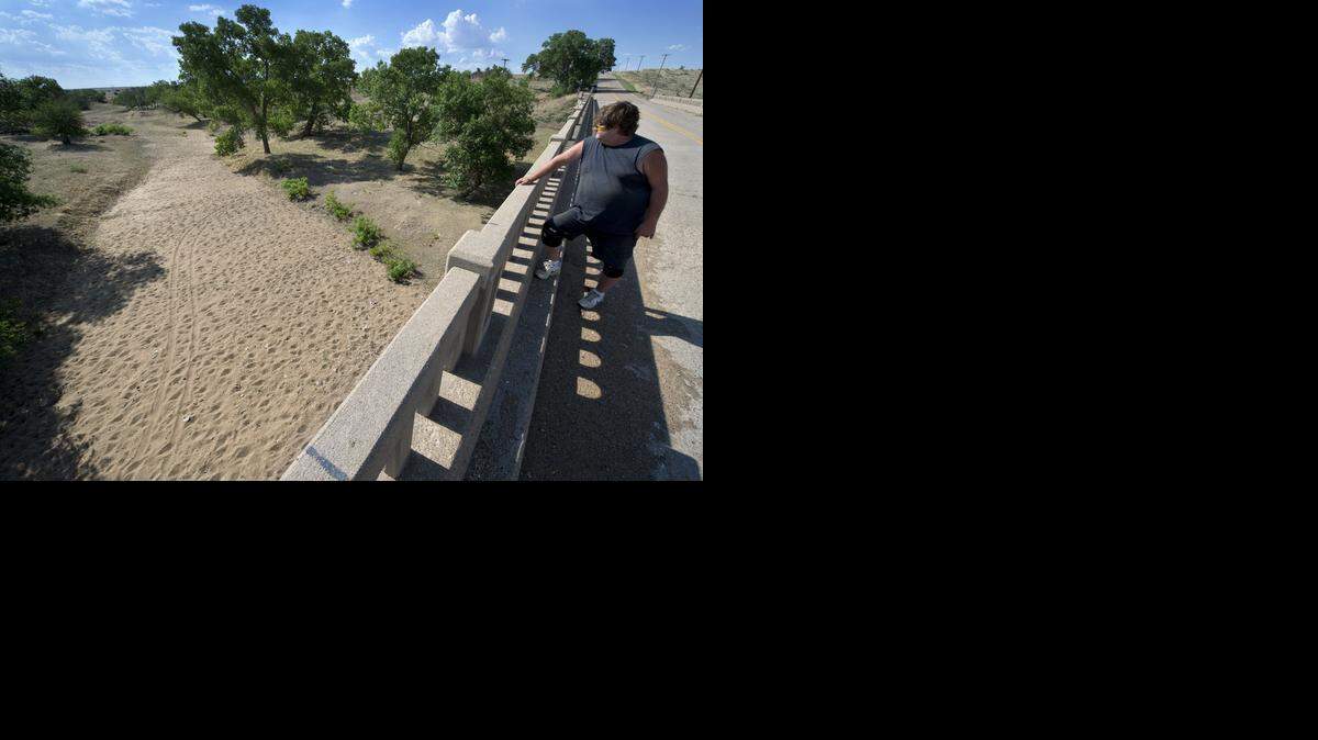 
“What we need is a gully washing, toad strangling rain,” Russell, Kan., Mayor Curt Mader said last week during a visit to the dry riverbed of the Smokey Hill River southwest of Russell, Kan. The city has 10 wells in the area.
