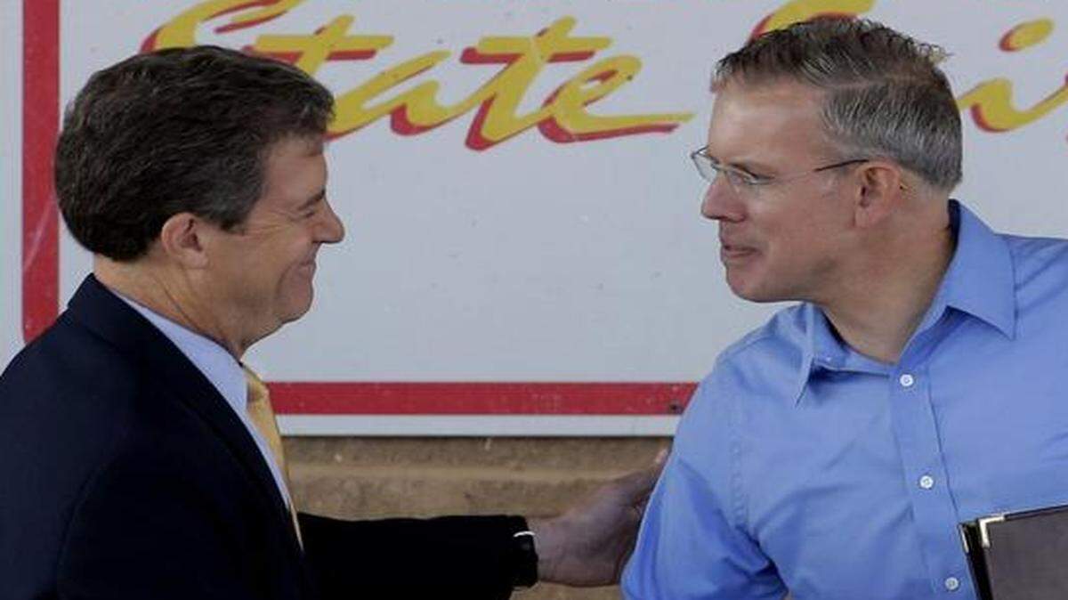 
Republican Gov. Sam Brownback, left, and his Democratic challenger, Paul Davis
