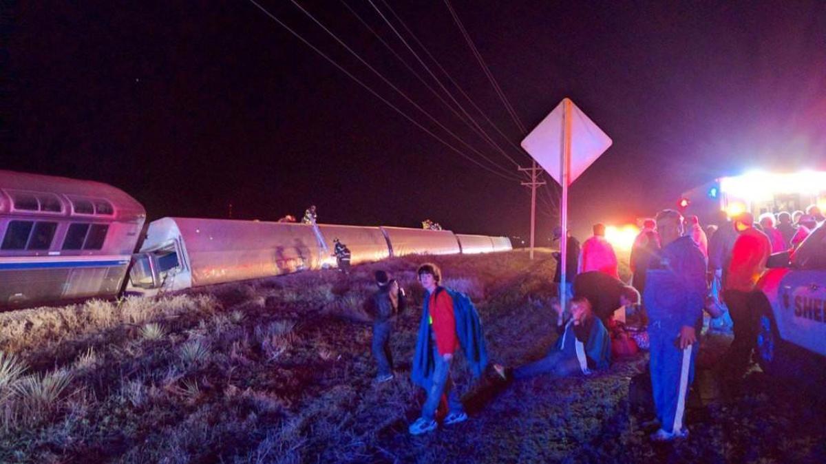 Passengers gathered early Monday after a train derailed near Dodge City, Kan. An Amtrak statement says the train was traveling from Los Angeles to Chicago early Monday when it derailed just after midnight.