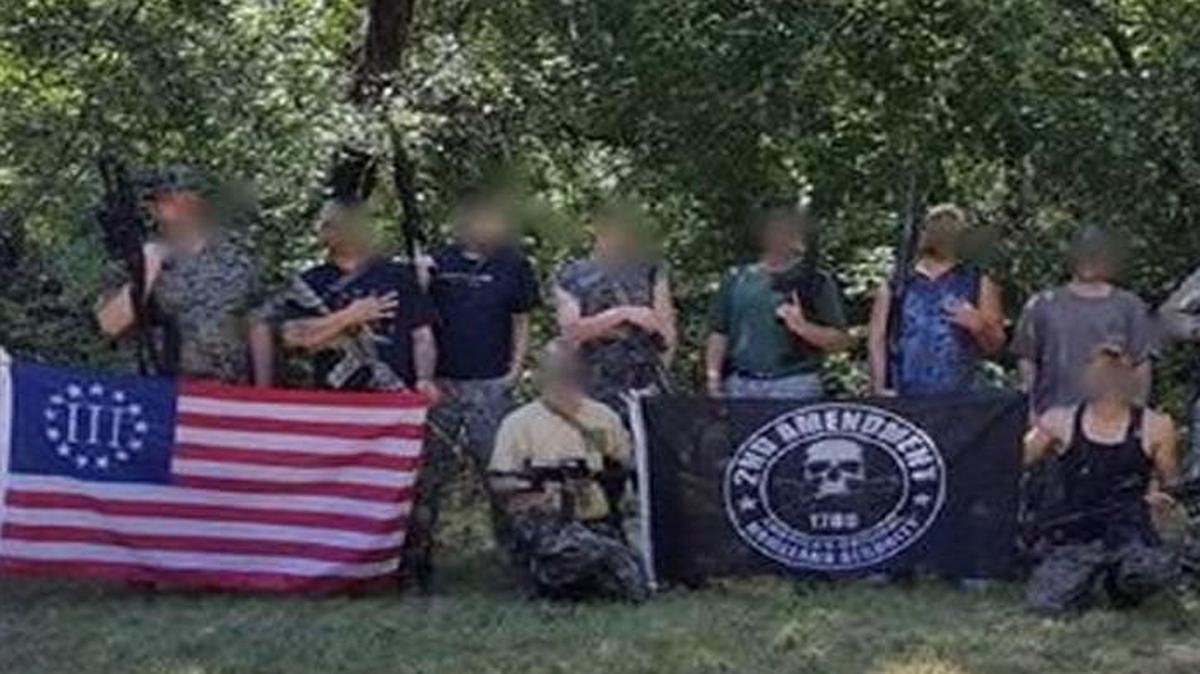 Members of the Kansas Flatlanders Militia participate in regular field and tactical training exercises. The militia, which formed about 18 months ago after members broke away from the Kansas Citizens Militia, says it has about 30 members. The group says it rejected two of the men charged in an alleged plot to attack Somali immigrants in Garden City, Kan., when leaders deemed them too extreme. Members’ faces are blurred because some said they didn’t want to go public.