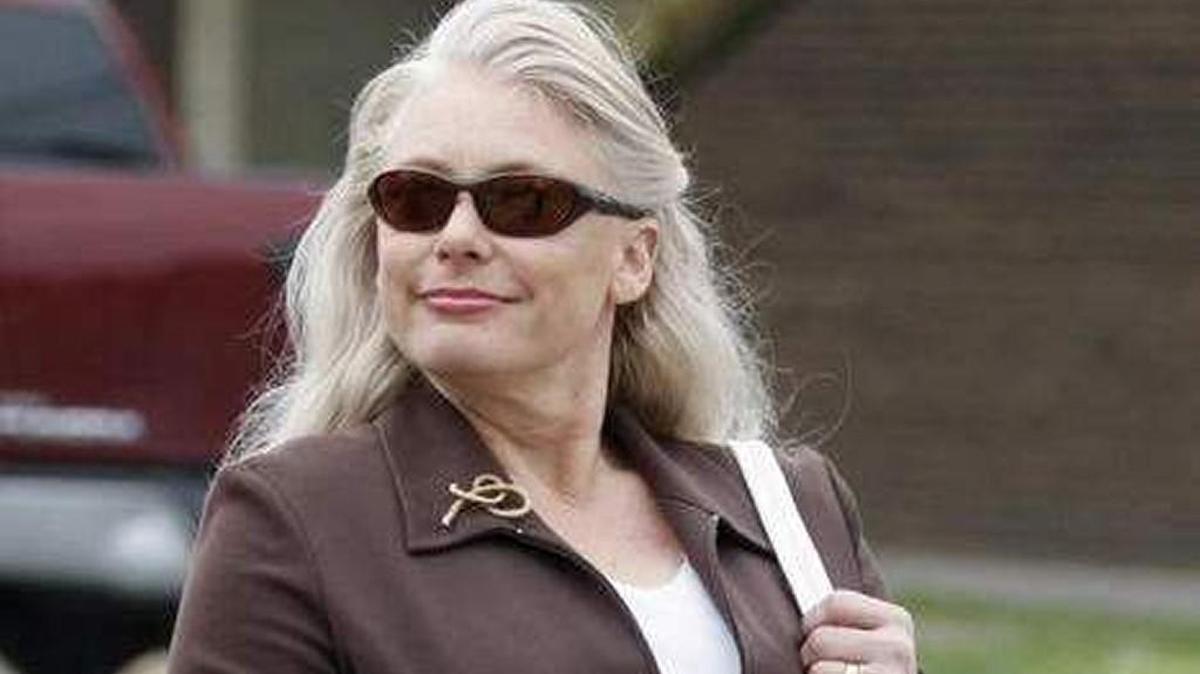 In this April 20, 2011 file photo, Angel Dillard of Valley Center, Kan., arrives at the U.S. Federal District Courthouse in Wichita, Kan. Opening statements are expected Tuesday in the 2011 lawsuit brought by the U.S. Department of Justice against Dillard, an anti -abortion activist, over a letter she sent to a Wichita physician saying someone might place an explosive under the doctor's car.