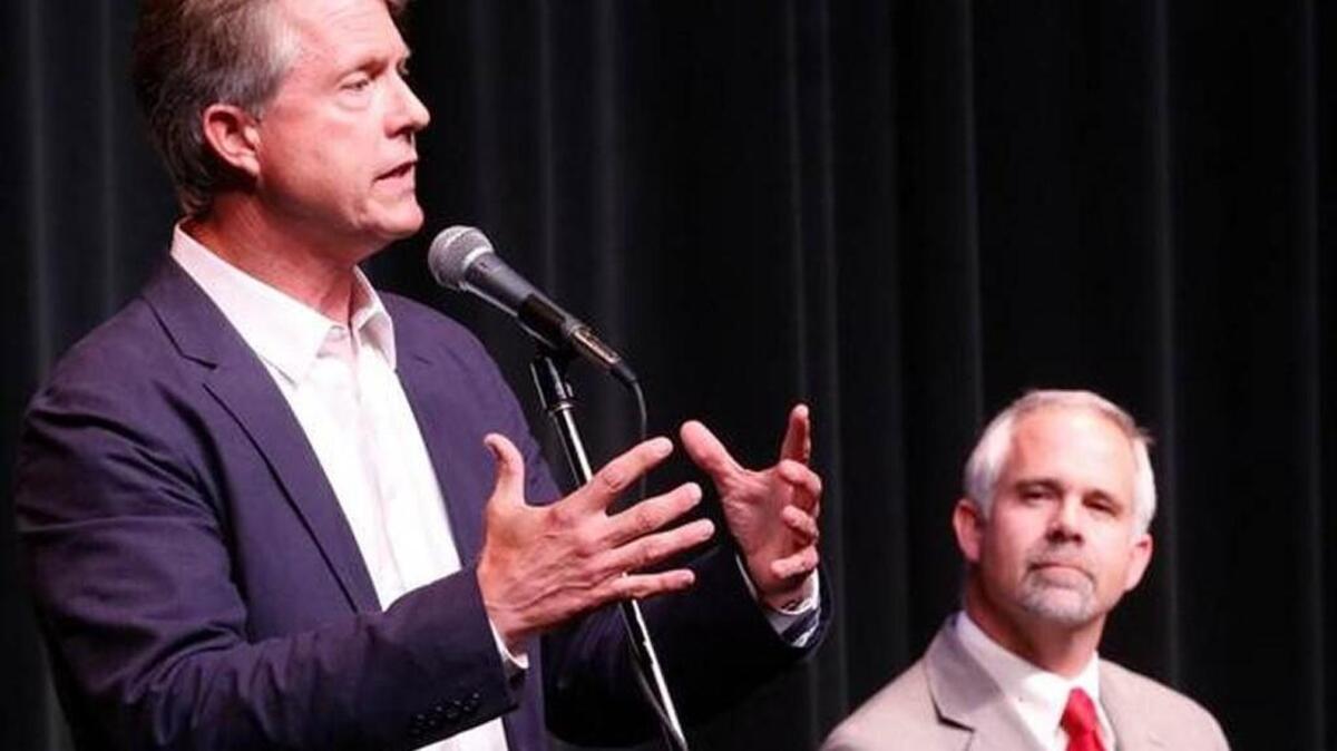 Great Bend obstetrician Roger Marshall, left, and U.S. Rep. Tim Huelskamp
