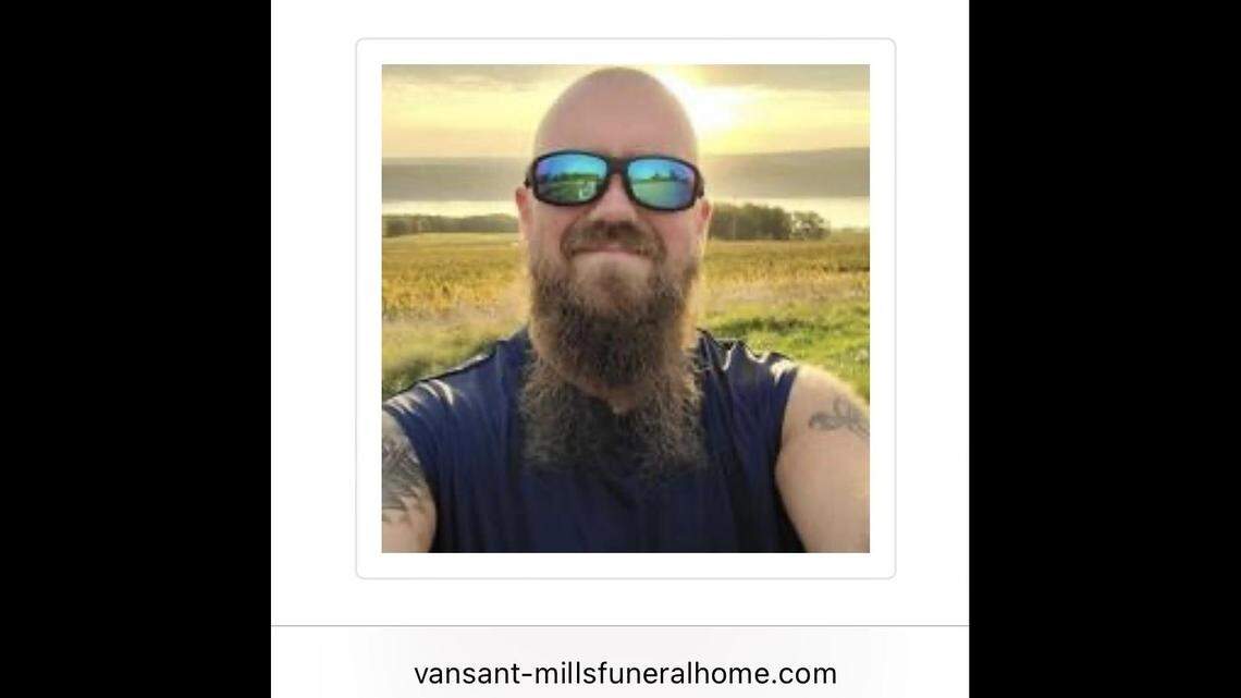 John McMurphy, 41, was shot and killed in Adrian, Missouri, according to deputies. His son is charged with homicide.