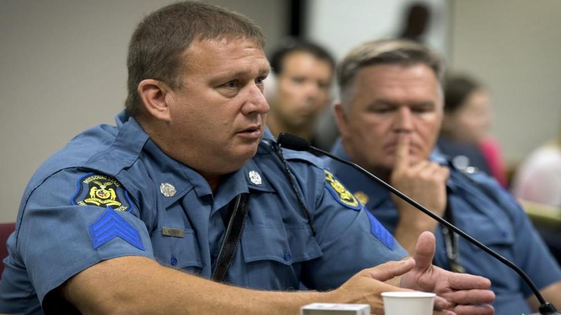 In a lawsuit filed Thursday in federal court, Randy Henry contends his demotion and reassignment by the Missouri Highway Patrol was in retaliation for his whistleblower actions after the drowning of Brandon Ellingson in May 2014. Henry (left) is shown testifying before a special Missouri House committee in October 2014.